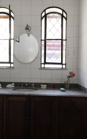 Casa de condomínio à venda com 392m², 4 quartos e 2 vagasBanheiro da Suíte 2