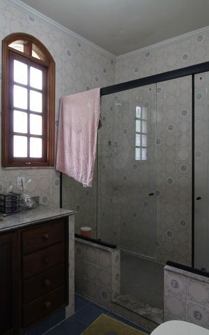 Casa de condomínio à venda com 392m², 4 quartos e 2 vagasBanheiro da Suíte 1