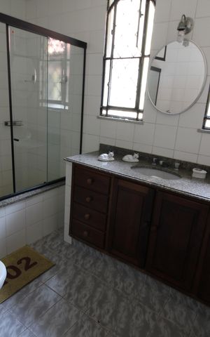 Casa de condomínio à venda com 392m², 4 quartos e 2 vagasBanheiro da Suíte 2