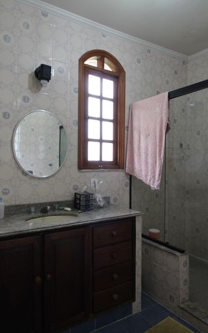Casa de condomínio à venda com 392m², 4 quartos e 2 vagasBanheiro da Suíte 1