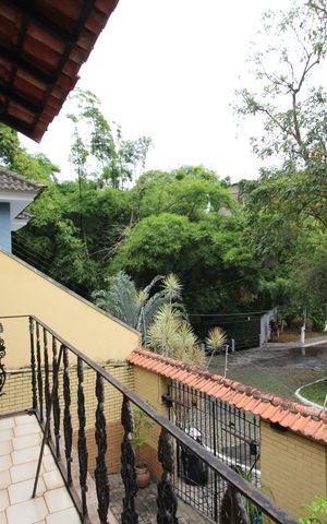 Casa de condomínio à venda com 392m², 4 quartos e 2 vagasSuíte 1 - Varanda