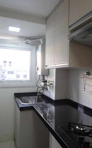 Apartamento à venda com 62m², 2 quartos e 1 vagaCozinha e Área de Serviço