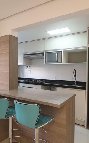 Apartamento à venda com 62m², 2 quartos e 1 vagaCozinha e Área de Serviço