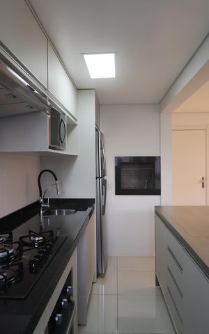 Apartamento à venda com 62m², 2 quartos e 1 vagaCozinha e Área de Serviço