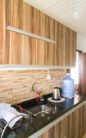 Casa à venda com 80m², 3 quartos e 2 vagas Casa à venda com 80m², 3 quartos e 2 vagasCozinha