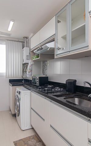 Apartamento à venda com 58m², 2 quartos e 2 vagasCozinha e Área de Serviço
