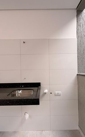 Casa à venda com 132m², 4 quartos e 2 vagas Casa à venda com 132m², 4 quartos e 2 vagasLavanderia