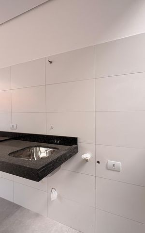 Casa à venda com 132m², 4 quartos e 2 vagas Casa à venda com 132m², 4 quartos e 2 vagasLavanderia