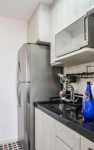 Apartamento à venda com 52m², 2 quartos e 1 vaga Apartamento à venda com 52m², 2 quartos e 1 vagaCozinha e Área de Serviço