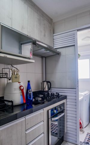 Apartamento à venda com 52m², 2 quartos e 1 vaga Apartamento à venda com 52m², 2 quartos e 1 vagaCozinha e Área de Serviço