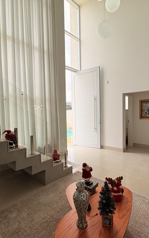 Casa de condomínio à venda com 483m², 4 quartos e 4 vagasSala