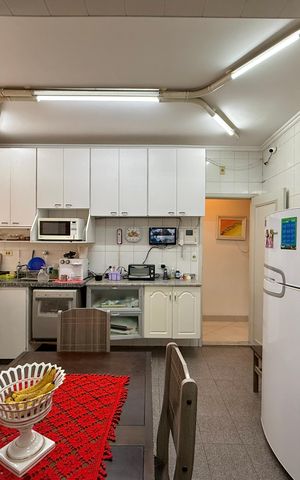 Casa à venda com 210m², 3 quartos e 2 vagas Casa à venda com 210m², 3 quartos e 2 vagasCozinha