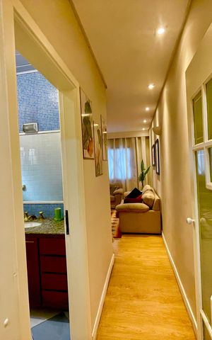 Casa à venda com 118m², 2 quartos e 2 vagasCorredor interno