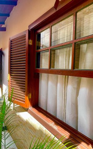 Casa à venda com 118m², 2 quartos e 2 vagasCorredor externo