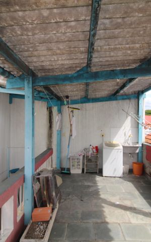 Casa à venda com 110m², 3 quartos e 2 vagasQuarto 1 - Varanda