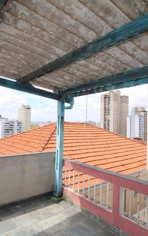Casa à venda com 110m², 3 quartos e 2 vagasQuarto 1 - Varanda