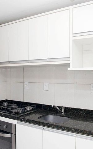 Apartamento à venda com 58m², 2 quartos e 2 vagasCozinha + Área de Serviço