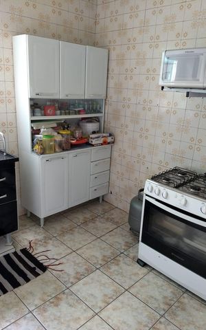 Casa à venda com 128m², 3 quartos e 1 vaga Casa à venda com 128m², 3 quartos e 1 vagaCozinha