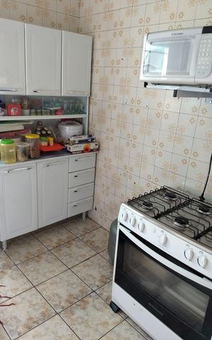 Casa à venda com 128m², 3 quartos e 1 vaga Casa à venda com 128m², 3 quartos e 1 vagaCozinha