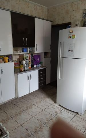 Casa à venda com 128m², 3 quartos e 1 vaga Casa à venda com 128m², 3 quartos e 1 vagaCozinha