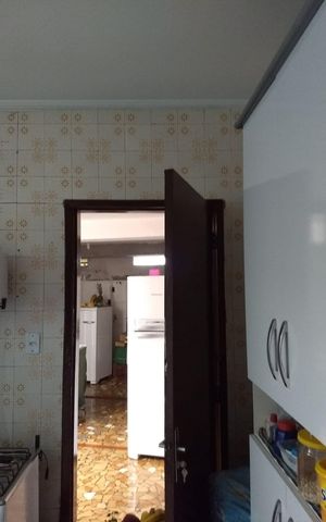 Casa à venda com 128m², 3 quartos e 1 vaga Casa à venda com 128m², 3 quartos e 1 vagaCozinha