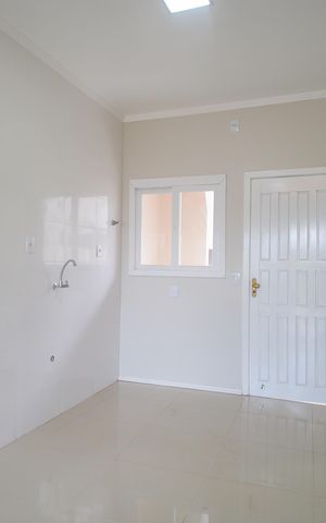 Casa à venda com 48m², 2 quartos e 1 vagaSala/Cozinha