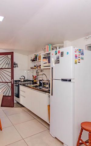 Casa à venda com 110m², 4 quartos e 1 vaga Casa à venda com 110m², 4 quartos e 1 vagaCozinha e Área de Serviço