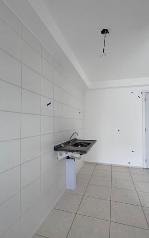 Apartamento à venda com 52m², 2 quartos e 1 vaga Apartamento à venda com 52m², 2 quartos e 1 vagaCozinha e Área de Serviço