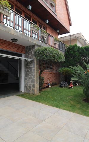 Casa à venda com 412m², 7 quartos e 5 vagasGaragem