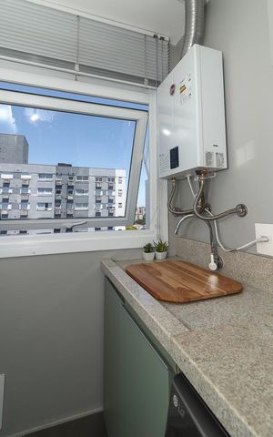 Apartamento à venda com 57m², 2 quartos e 2 vagasCozinha e Área de Serviço