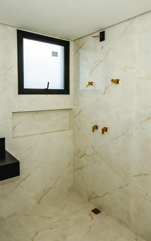 Casa à venda com 222m², 4 quartos e 3 vagasBanheiro da Suíte 2