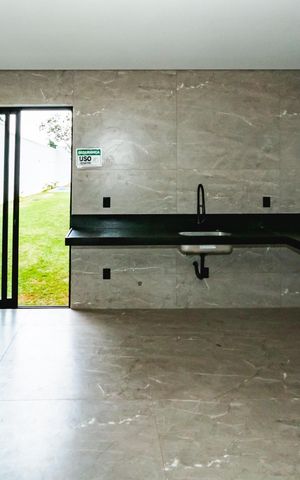 Casa à venda com 222m², 4 quartos e 3 vagasSala/cozinha