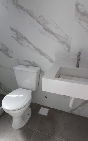 Casa de condomínio à venda com 192m², 3 quartos e 3 vagasBanheiro Social
