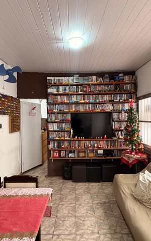 Casa à venda com 154m², 2 quartos e 2 vagas Casa à venda com 154m², 2 quartos e 2 vagasSala
