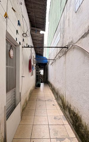 Casa à venda com 154m², 2 quartos e 2 vagas Casa à venda com 154m², 2 quartos e 2 vagasCorredor