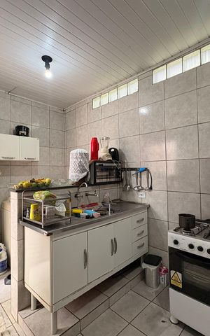 Casa à venda com 154m², 2 quartos e 2 vagas Casa à venda com 154m², 2 quartos e 2 vagasCozinha