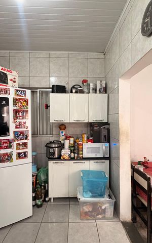 Casa à venda com 154m², 2 quartos e 2 vagas Casa à venda com 154m², 2 quartos e 2 vagasCozinha