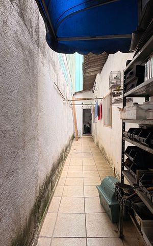 Casa à venda com 154m², 2 quartos e 2 vagas Casa à venda com 154m², 2 quartos e 2 vagasCorredor