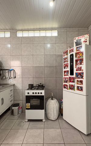 Casa à venda com 154m², 2 quartos e 2 vagas Casa à venda com 154m², 2 quartos e 2 vagasCozinha