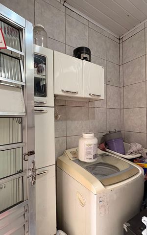 Casa à venda com 154m², 2 quartos e 2 vagas Casa à venda com 154m², 2 quartos e 2 vagasLavanderia