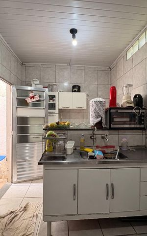 Casa à venda com 154m², 2 quartos e 2 vagas Casa à venda com 154m², 2 quartos e 2 vagasCozinha