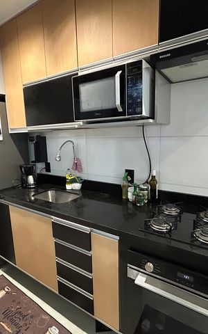 Apartamento à venda com 52m², 2 quartos e 2 vagasCozinha