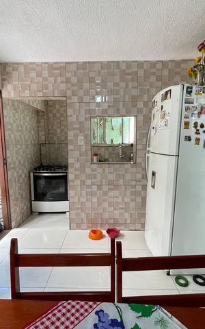 Casa à venda com 130m², 4 quartos e 1 vaga Casa à venda com 130m², 4 quartos e 1 vagaCozinha