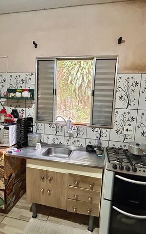 Casa à venda com 200m², 3 quartos e 5 vagas Casa à venda com 200m², 3 quartos e 5 vagasCozinha