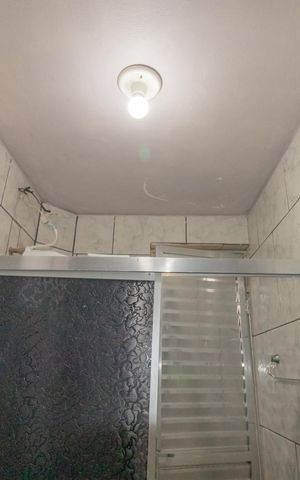 Casa à venda com 120m², 3 quartos e 2 vagas Casa à venda com 120m², 3 quartos e 2 vagasBanheiro da Suíte 1