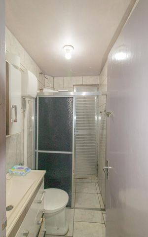 Casa à venda com 120m², 3 quartos e 2 vagas Casa à venda com 120m², 3 quartos e 2 vagasBanheiro da Suíte 1