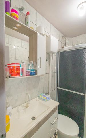 Casa à venda com 120m², 3 quartos e 2 vagas Casa à venda com 120m², 3 quartos e 2 vagasBanheiro da Suíte 1