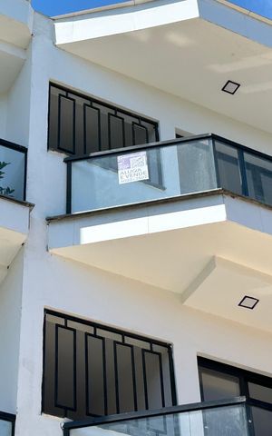 Apartamento para alugar com 100m², 2 quartos e 1 vagaFachada + plaquinha