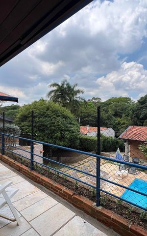 Casa de condomínio para alugar com 400m², 4 quartos e 5 vagasVaranda da casa de hóspedes