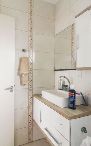 Casa à venda com 195m², 4 quartos e 2 vagas Casa à venda com 195m², 4 quartos e 2 vagasBanheiro da Suíte 1